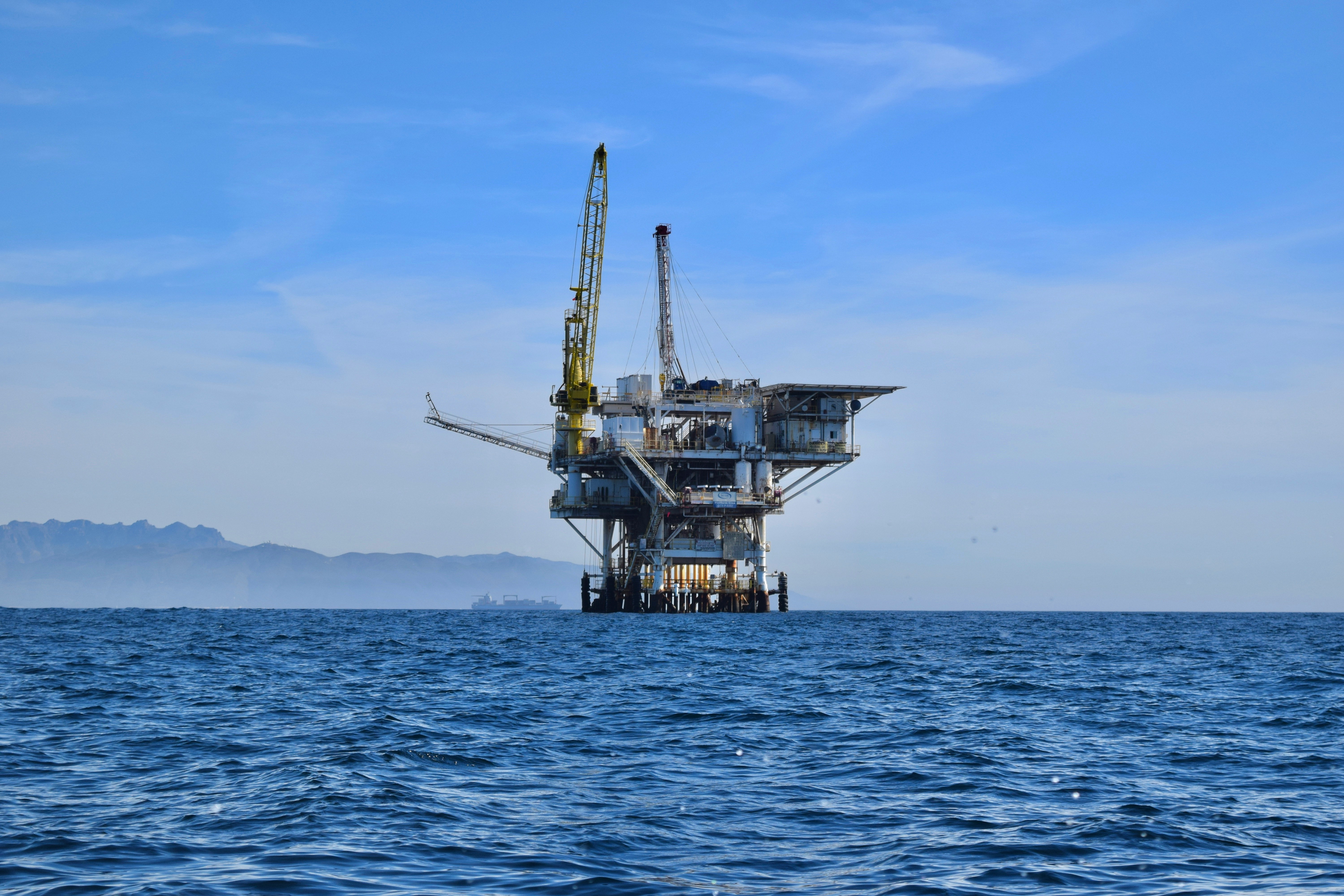 Offshore oil platform with crane at sea